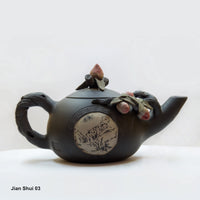 Jian Shui 03:  Handcrafted Teapot with Flower Buds and White Medallion