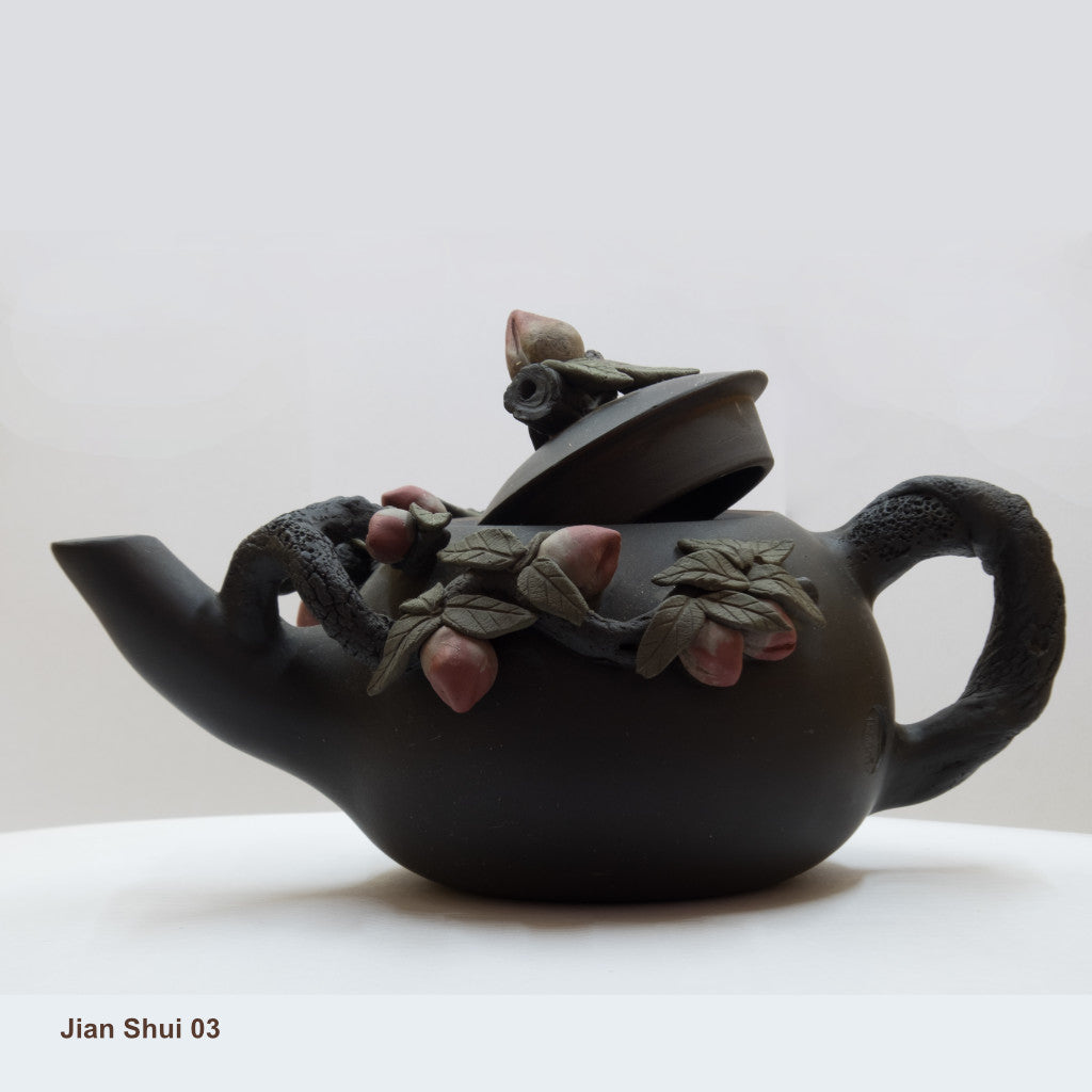Jian Shui 03: Handcrafted Teapot with Flower Buds and White Medallion