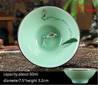 Goldfish Swimming in your teacup.  Hand-painted Longquan Celadon Porcelain - Set of Two
